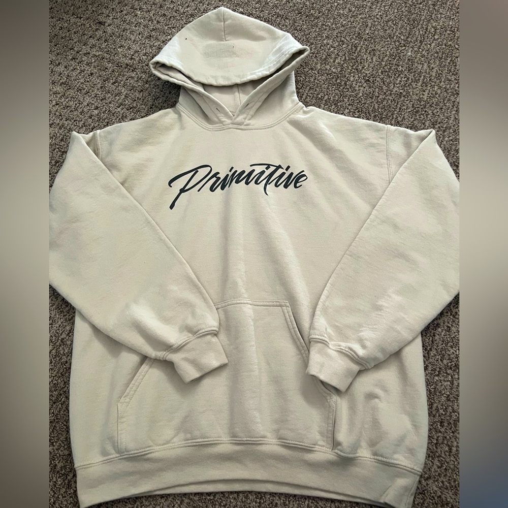 Tan colored cursive writing hoodie